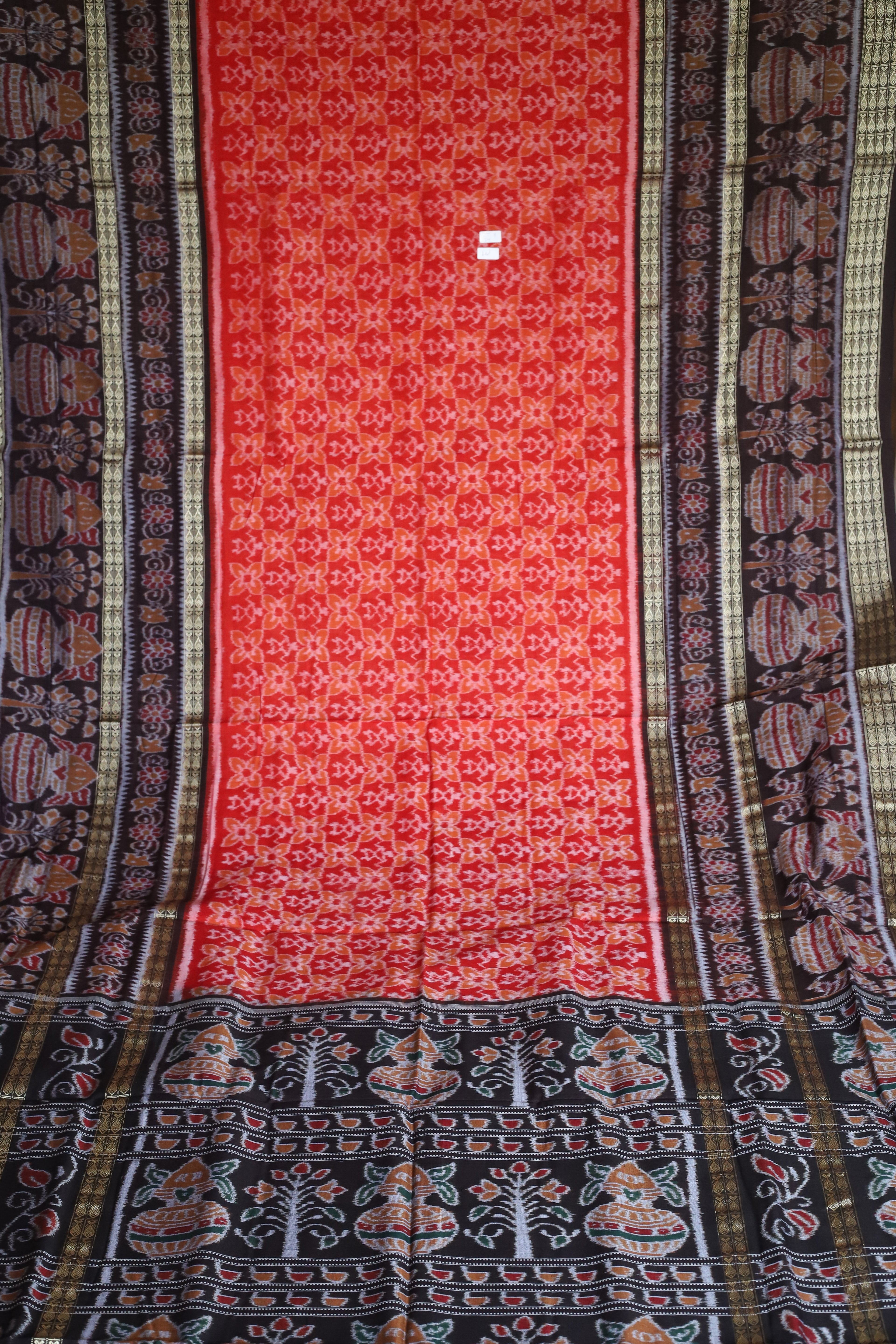 Authentic Double-Border Sambalpuri Ikat Saree: Orange & Black by Bandha Stories